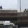 Man attempting to jump off Falomo Bridge [Ikejabird]