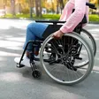 Handicapped black lady in wheel chair [Depositphotos]