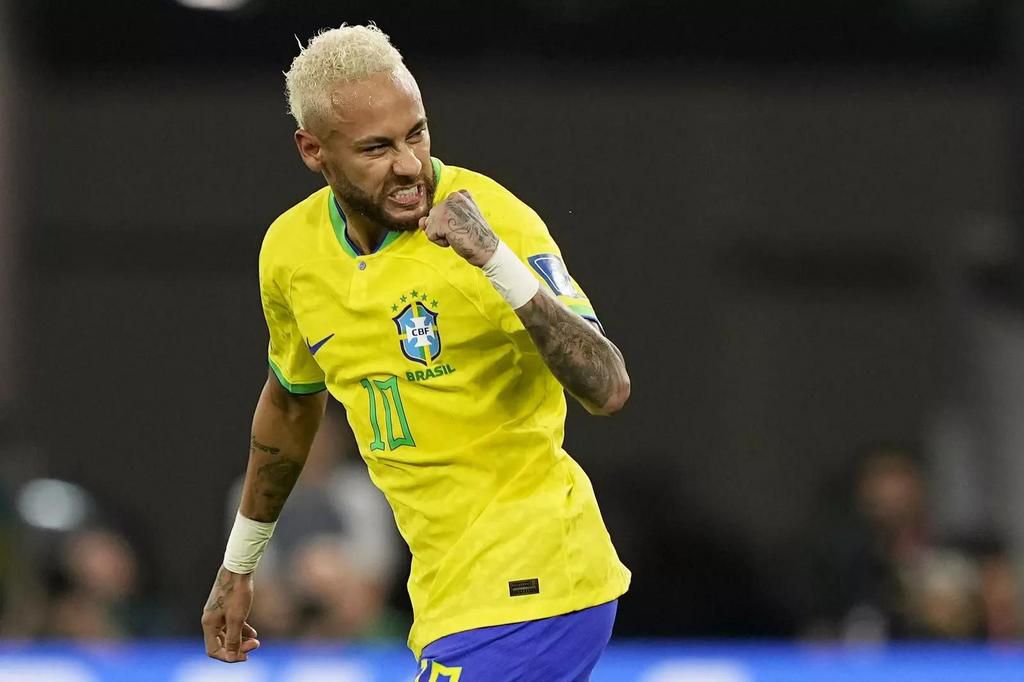 Neymar celebrates after scoring against South Korea in the world cup round of 16