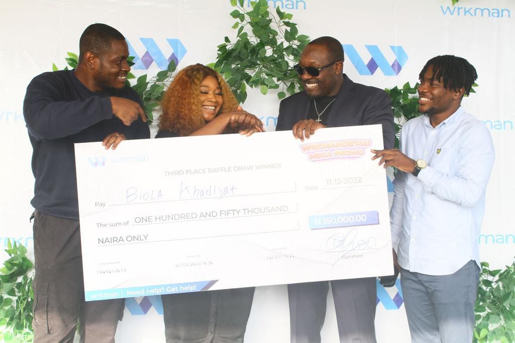 (L-R) Chief Operating Officer, Wrkman, Kechi Okpara, Wrkmandey4u Mega Promo Second Runner-up Winner of N150,000, Biola Khadijat; Chief Executive Officer, Wrkman, Biola Khadijat and Chief Marketing Officer, Wrkman, Oluwakayode Akinbode, at the Wrkmandey...