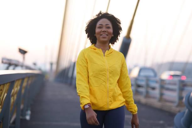 Woman in training gear walking