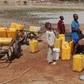 Residents struggling to fetch water from a pond in Sabongida community of Langtang South. [NAN]