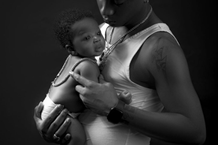 Bella Shmurda and his baby boy who was born in July 2023 [Twitter/Bellashmurda]