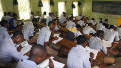 Secondary School students writing WAEC exams.