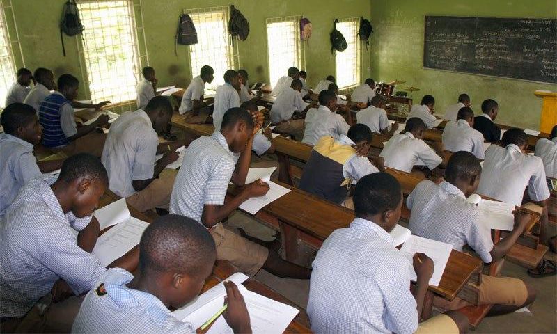 Secondary School students writing WAEC exams.