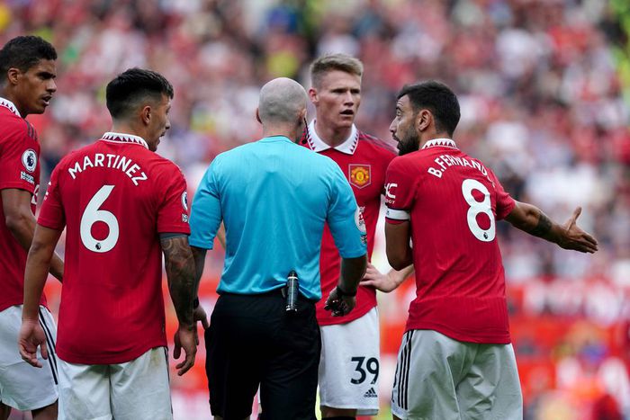 Referee Mike Dean eventually ruled in favour of Manchester United, but the decision has now been called into question (PA Images)