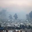 Smoke rises above buildings during an Israeli airstrike in Gaza on October 9, 2023.Mustafa Hassona/Anadolu Agency via Getty Images