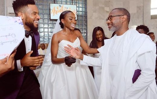 Kunle Remi, Tiwi and Femi Otedola all smiles at the church wedding [Instagram/Femiotedola]