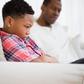 Father and son arguing in a sofa