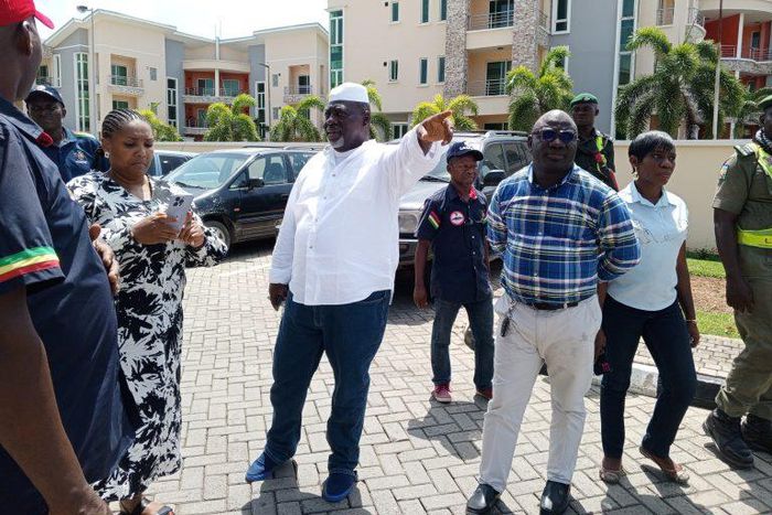 General Manager, Lagos State Building Control Agency, Mr Gbolahan Oki (middle). [NAN]