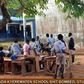 Students forced to study under trees due to continuous mystery defecation in classrooms