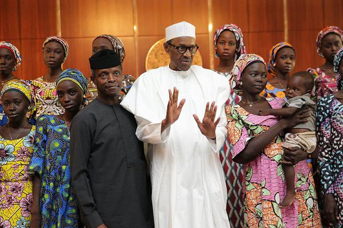 Vice President, Prof Yemi Osinbajo, President-Muhammadu Buhari with some Chibok girls.