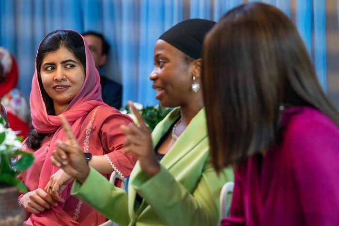L-R: Malala Yousafzai, Maryam "Taaooma" Apaokagi, and Susan Pwajok [Grace Ekpu/Malala Fund]