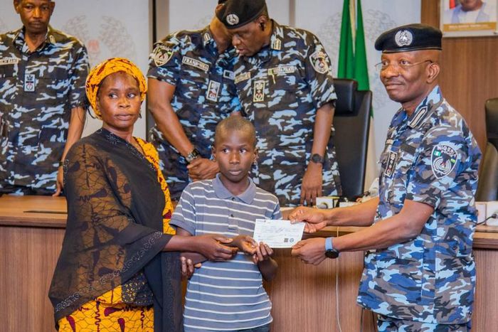Egbetokun presents ₦535.6m cheques to families of deceased officers. [Twitter:@PoliceNG]