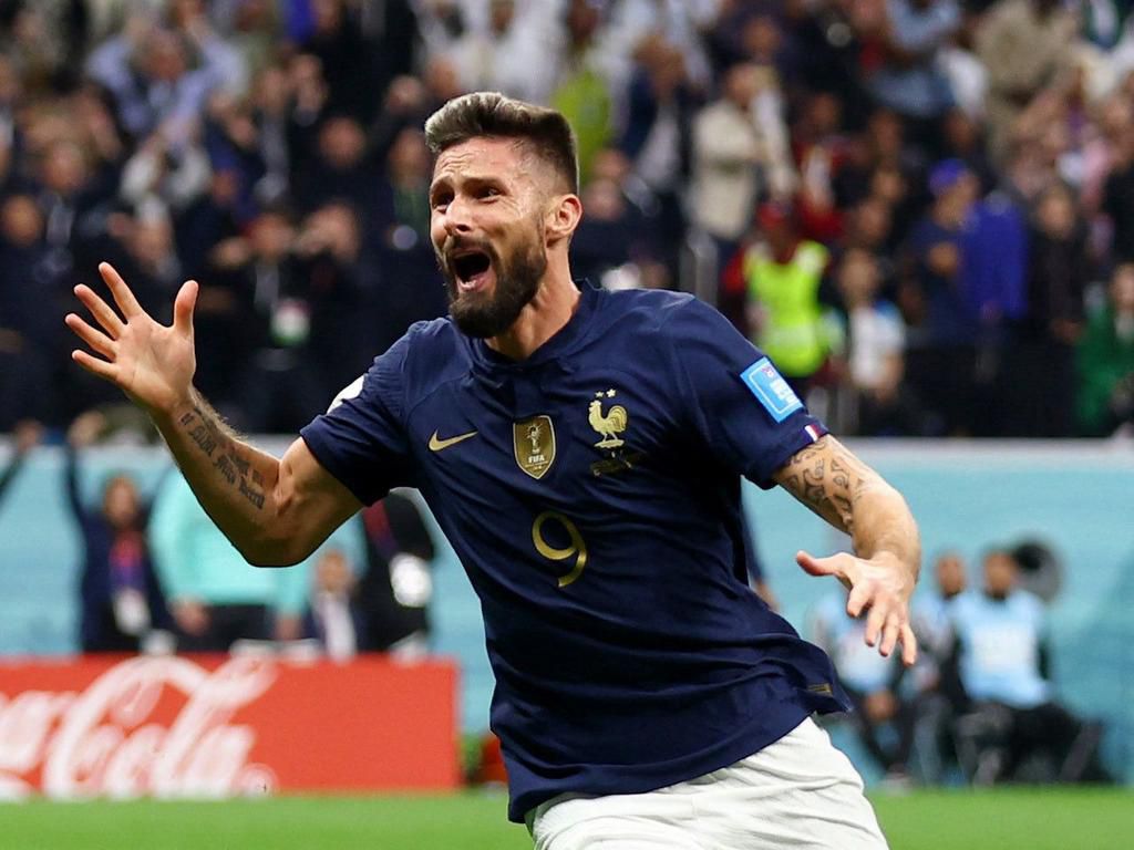 Olivier Giroud celebrates after scoring the winning goal for France against England