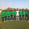 The Flying Eagles line up before defeating NPFL side Lobi Stars in Abuja on Saturday
