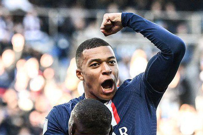 Kylian Mbappe celebrates after opening the scoring for PSG against Auxerre