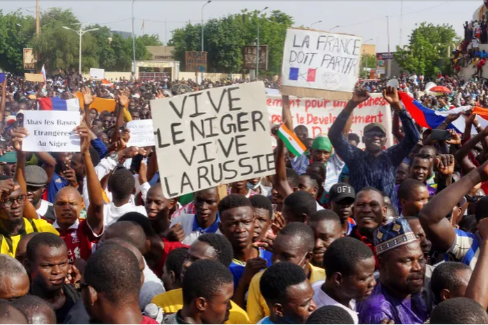Nigeriens celebrating the military overthrow of President Bazoum. [Aljazeera]