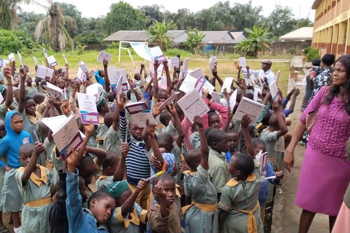 Pupils of one of the schools that benefited from the NGO's distribution of free educational materials in Ikorodu. [Nature's Treasure]