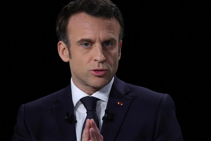 French President Emmanuel Macron, candidate for his re-election in the 2022 French presidential election, gestures as he speaks during a news conference to unveil his presidential program at Les Docks de Paris, in Aubervilliers near Paris, France, Marc...