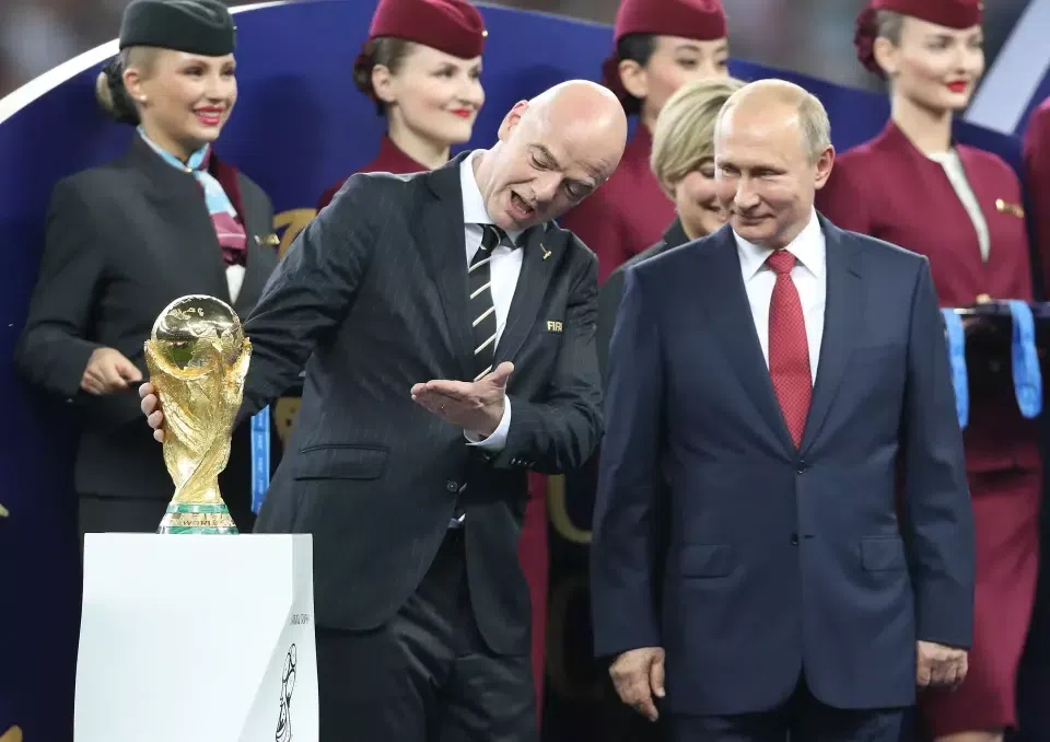 FIFA President Gianni Infantino (L) and Russian President Vladimir Putin at the 2018 FIFA World Cup in Russia