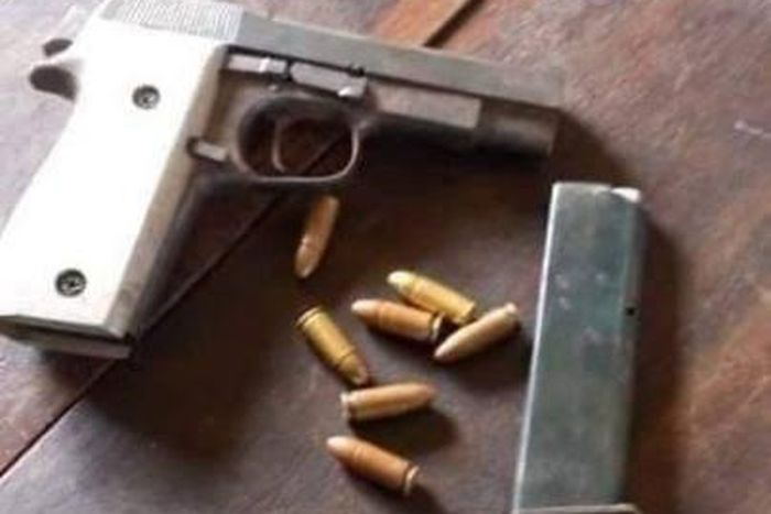 Pistol recovered from the boy [The News Nigeria]