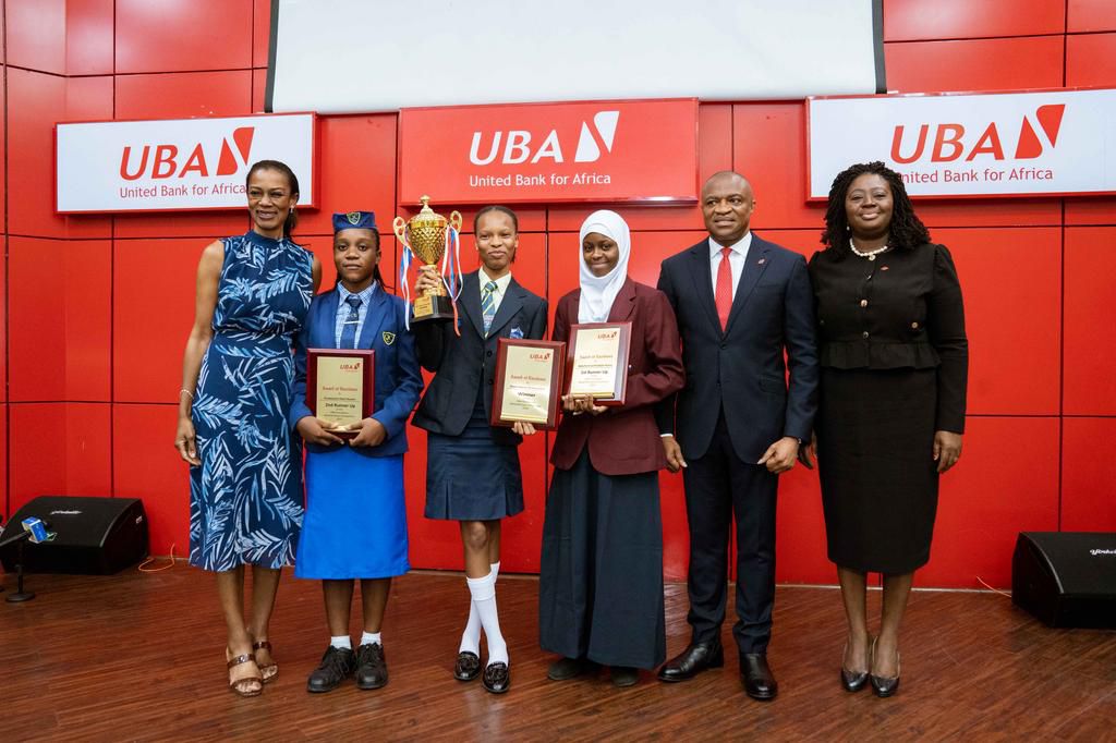 L-R: Managing Director/CEO , United Bank for Africa(UBA) Foundation, Mrs Bola Atta; 3rd Prize winner, 2023 UBA National Essay Competition and Student of Queens College Yaba, Chukwuka-Okoh Naomi Chizaram ; Grand Prize winner, and Student of Fountain Hei...