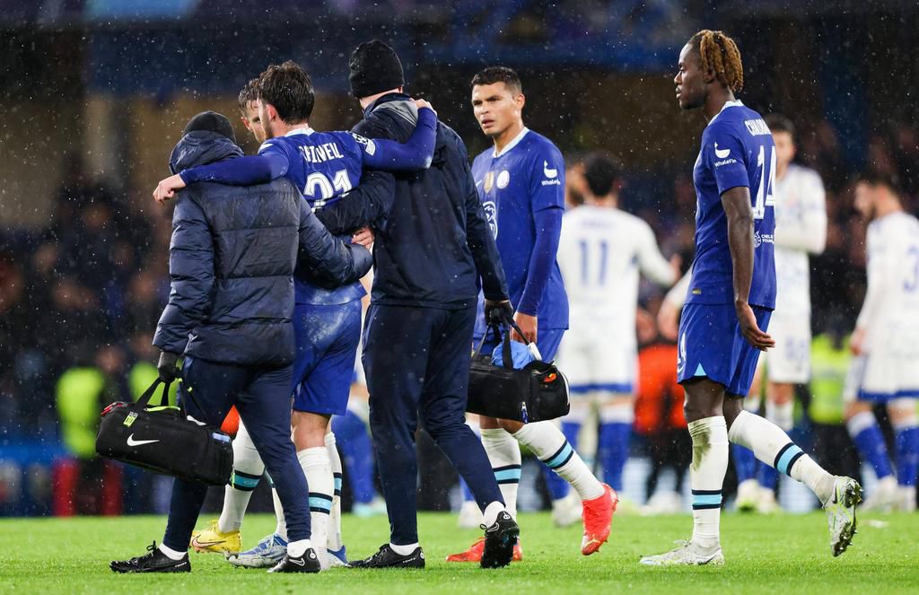 Ben Chilwell of Chelsea pulls up with a hamstring injury, and leaves the field on November 2, 2022.