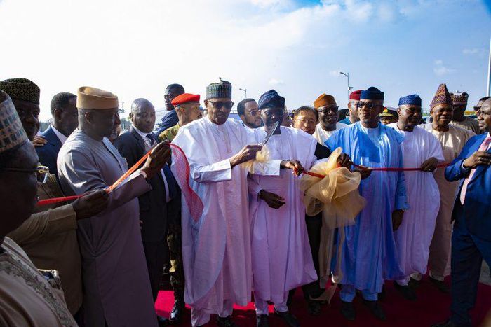 L-R: Minister of Transportation, Mu’Azu Jaji Sambo; President Muhammadu Buhari; Lagos State Governor, Babajide Sanwo-Olu; Chinese Ambassador to Nigeria, Mr. Cui Jianchun; former Governor of Ekiti State, Dr Kayode Fayemi; Ogun State Governor, Prince Dap...