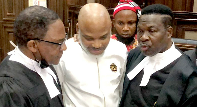 Proscribed leader of IPOV, Nnamdi Kanu flanked by his lawyers Mike Ozekhome and Ifeanyi Ejiofor. (Channels TV)