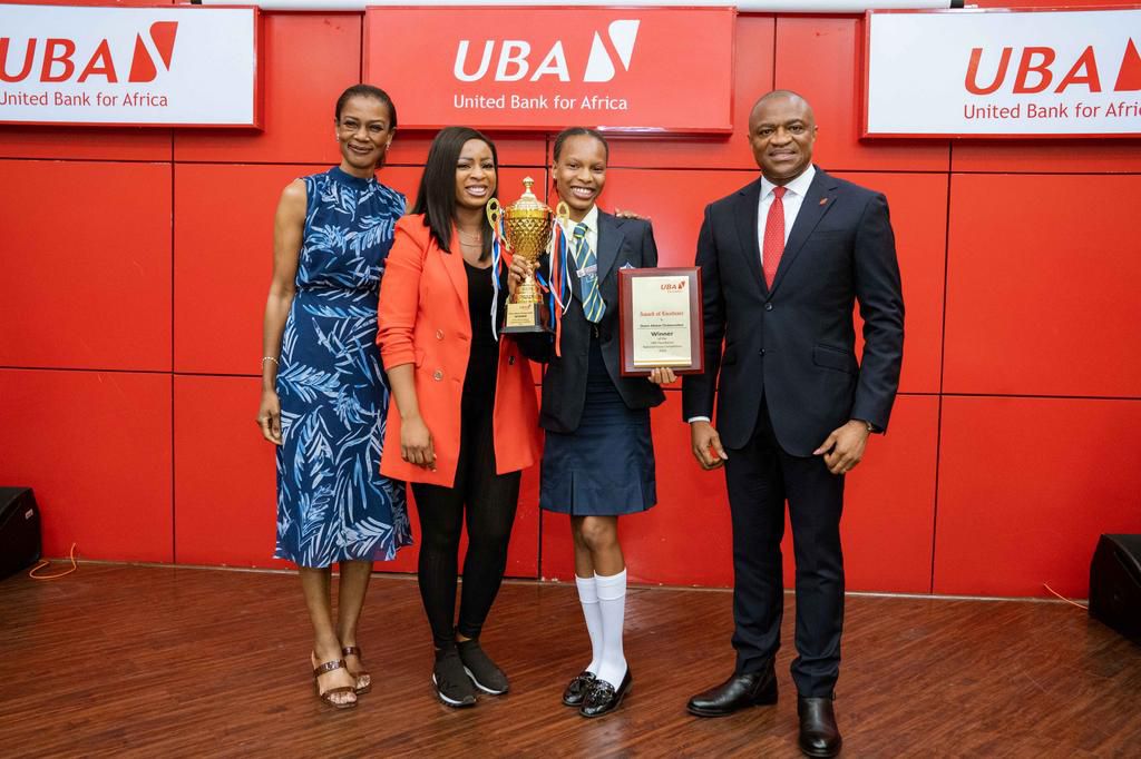 L-R: Managing Director/CEO , United Bank for Africa(UBA) Foundation, Mrs Bola Atta; Mother of Winner, 2023, National Essay Competition, Veronica Anaro; Grand Prize winner, and Student of Fountain Heights Secondary School, Adaeze Onaro and Group Managin...