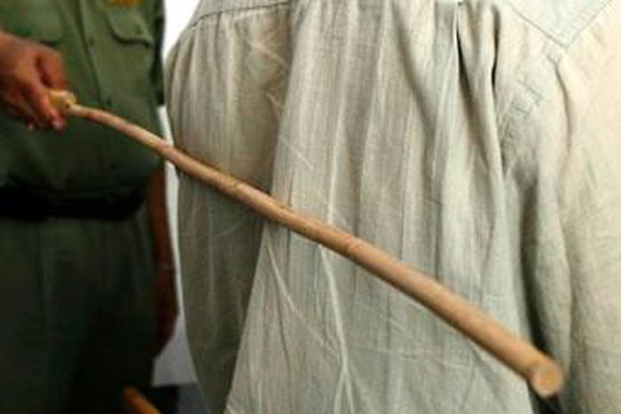 A person receiving strokes of cane [Tribune Online]