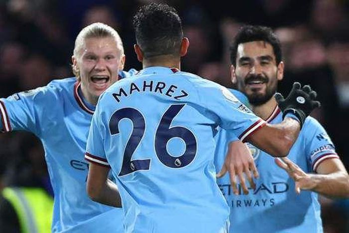 Riyad Mahrez celebrates after scoring for Manchester City against Chelsea