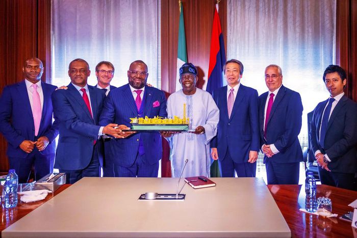 GMD of UTM, Mr Julius Rone, MD of Japan Gas Company and Senior VP of Technip present the prototype of Nigeria's first ever Floating Liquefied Natural Gas (FLNG) facility to President Bola Ahmed Tinubu (GCFR) at the State House. [Presidency]