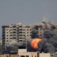 An Israeli strike on a residential tower in Gaza City on October 12.Ahmad Hasaballah/Getty Images