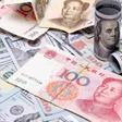 yuan to dollar (ShanghaiDaily)