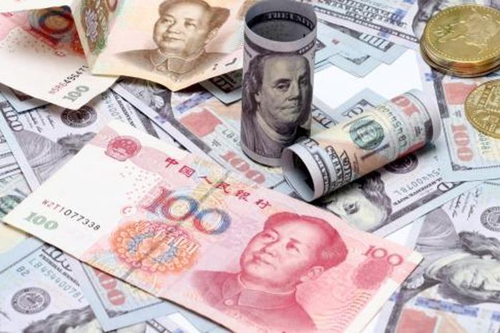 yuan to dollar (ShanghaiDaily)