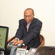 Godwin Emefiele, Governor of the Central Bank of Nigeria during a biometric exercise