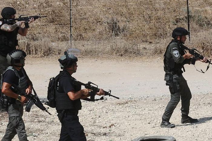 Israeli forces, dispatched to the border with Gaza in southern Israel, scan the area near Ashdod on October 8, 2023 as the battle against holdout Hamas fighters continuesGil Cohen-Magen/AFP via Getty Images
