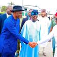 SDP governorship candidate in Rivers State, Senator Magnus Abe exchanging pleasantries with Governor Nyesom Wike in the presence of the president-elect, Asiwaju Bola Tinubu. [Twitter:BATMedia]