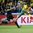 Siphiwe Tshabalala (R) from hosts South Africa scores the first goal of the 2010 World Cup, against Mexico in a drawn group match