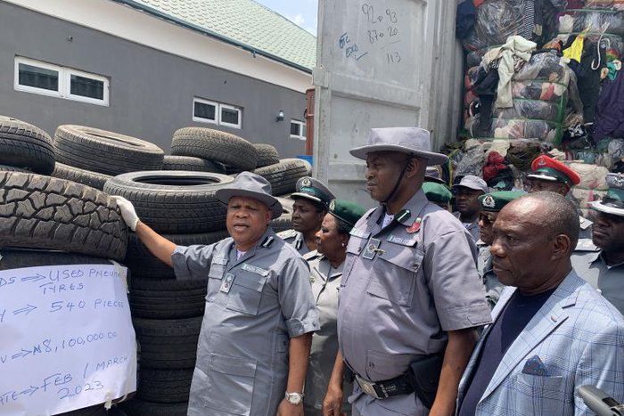 Ag Comptroller, Federal Operations Unit Zone ’C’ of the Nigeria Customs Service, Mr Kayode Kolade, a Deputy Comptroller of Customs (DC), displaying contraband seized by the Zone in Owerri, on Wednesday.