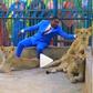 Pastor enters zoo, plays with lions to prove to church members that he’s powerful