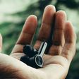 Wireless earphones in a person's hand [Image: Swamy K]