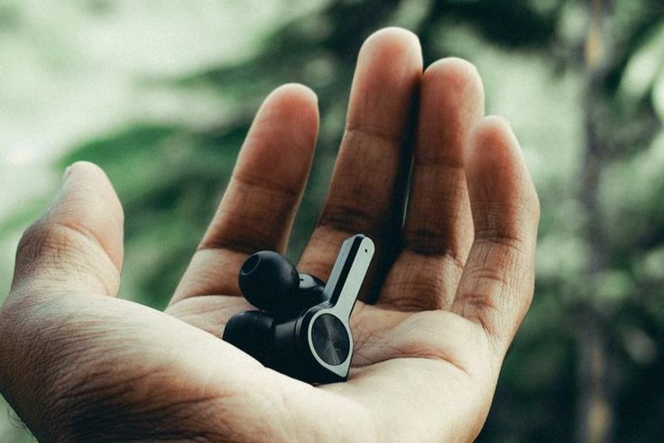 Wireless earphones in a person's hand [Image: Swamy K]
