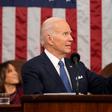President Joe Biden gestures toward first lady Jill Biden as he delivers the State of the Union address to a joint session of Congress on February 7, 2023 in the House Chamber of the U.S. Capitol in Washington, DC. The speech marks Biden's first addres...