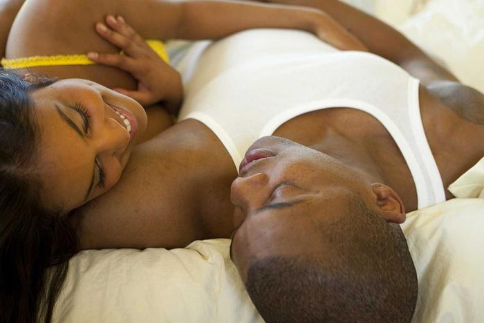 Black couple in bed (Courtesy)
