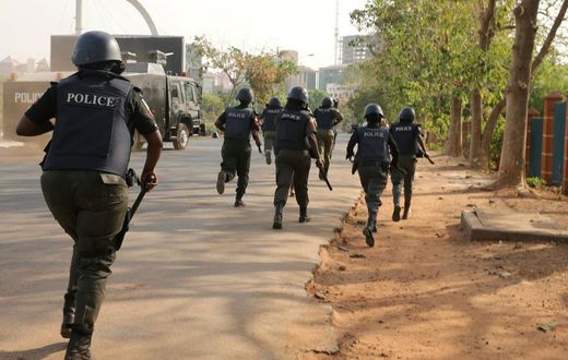 Nigerian Police officers on the run (Illustraton - NewDawnNigeria)