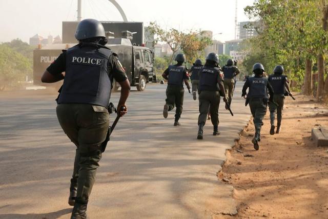 Nigerian Police officers on the run (Illustraton - NewDawnNigeria)