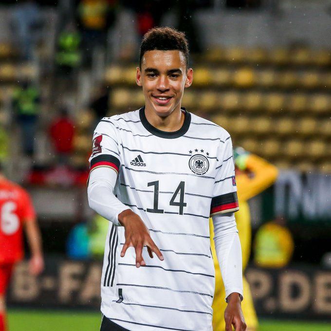 Jamal Musiala celebrating after scoring for Germany